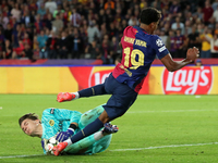 Lamine Yamal and Marvin Keller play during the match between FC Barcelona and BSC Young Boys in the week 2 of the League Stage of the UEFA C...