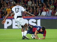 Robert Lewandowski and Mohamed Camara play during the match between FC Barcelona and BSC Young Boys in the week 2 of the League Stage of the...