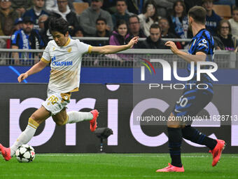 Youngwoo Seol of FK Crvena Zvezda is in action during the UEFA Champions League 2024/25 League Phase MD2 match between F.C. Inter and F.K. C...