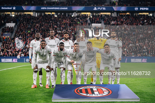 AC Milan players pose for a team photo prior to the UEFA Champions League 2024/25 League Phase MD2 match between Bayer 04 Leverkusen and AC...