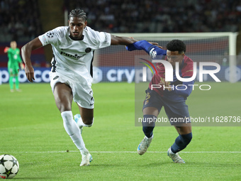 Alejandro Balde and Ebrima Colley play during the match between FC Barcelona and BSC Young Boys in the week 2 of the League Stage of the UEF...