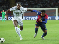 Alejandro Balde and Ebrima Colley play during the match between FC Barcelona and BSC Young Boys in the week 2 of the League Stage of the UEF...