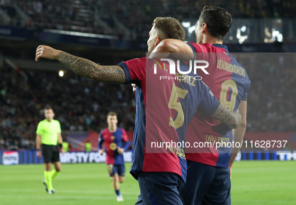 Inigo Martinez and Robert Lewandowski celebrate a goal during the match between FC Barcelona and BSC Young Boys in the week 2 of the League...