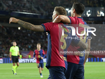 Inigo Martinez and Robert Lewandowski celebrate a goal during the match between FC Barcelona and BSC Young Boys in the week 2 of the League...