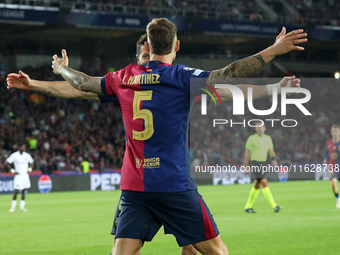 Inigo Martinez and Robert Lewandowski celebrate a goal during the match between FC Barcelona and BSC Young Boys in the week 2 of the League...