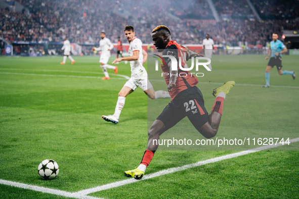 Victor Boniface of Bayer 04 Leverkusen is in action during the UEFA Champions League 2024/25 League Phase MD2 match between Bayer 04 Leverku...