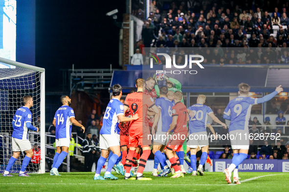 Goalkeeper #21, Ryan Allsop of Birmingham takes the ball from the head of a Huddersfield player during the Sky Bet League 1 match between Bi...