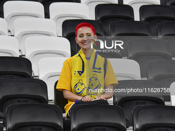 A fan of Al Gharafa SC looks on before the AFC Champions League elite west football match between Qatar's Al Gharafa SC and United Arab Emir...