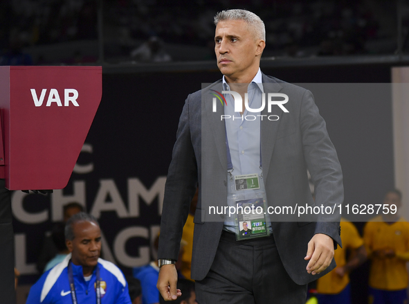 Al Ain FC Head Coach, Hernan Crespo, looks on before the AFC Champions League elite west football match between Qatar's Al Gharafa SC and Un...