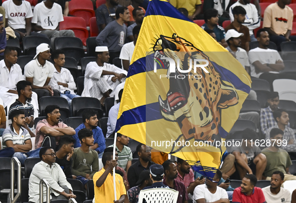 Al Gharafa SC supporters cheer for their team during the AFC Champions League elite west football match between Qatar's Al Gharafa SC and Un...