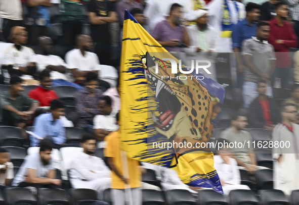 Al Gharafa SC supporters cheer for their team during the AFC Champions League elite west football match between Qatar's Al Gharafa SC and Un...