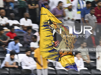 Al Gharafa SC supporters cheer for their team during the AFC Champions League elite west football match between Qatar's Al Gharafa SC and Un...