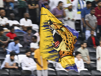 Al Gharafa SC supporters cheer for their team during the AFC Champions League elite west football match between Qatar's Al Gharafa SC and Un...