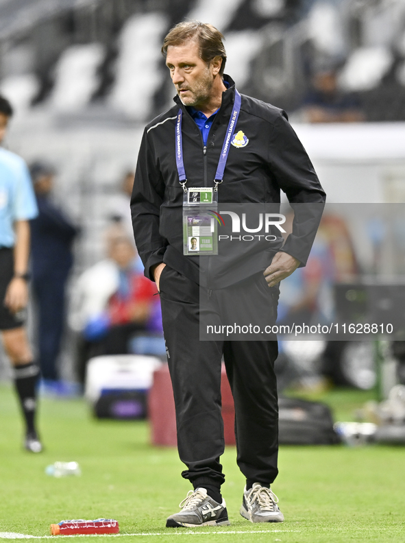 Al-Gharafa SC Head Coach, Pedro Rui Martins, looks on before the AFC Champions League elite west football match between Qatar's Al Gharafa S...