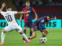 Pedri and Kastriot Imeri play during the match between FC Barcelona and BSC Young Boys in the week 2 of the League Stage of the UEFA Champio...