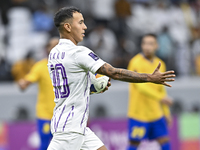 Kaku of Al Ain FC celebrates after scoring a goal during the AFC Champions League elite west football match between Qatar's Al Gharafa SC an...