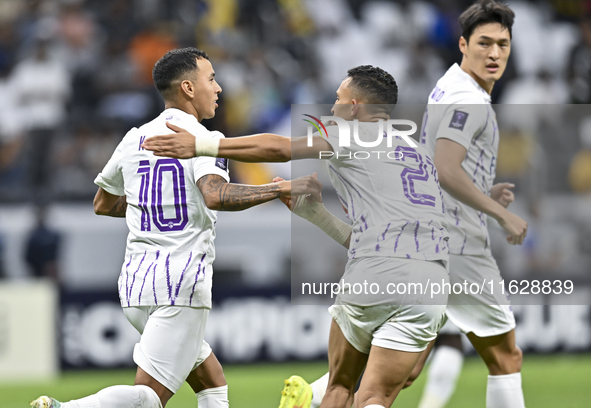 Kaku of Al Ain FC celebrates after scoring a goal during the AFC Champions League elite west football match between Qatar's Al Gharafa SC an...