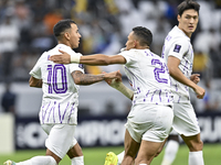 Kaku of Al Ain FC celebrates after scoring a goal during the AFC Champions League elite west football match between Qatar's Al Gharafa SC an...