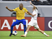 Yacine Brahimi (L) of Al Gharafa SC and Matias Segovia of Al Ain FC in action during the AFC Champions League elite west football match betw...