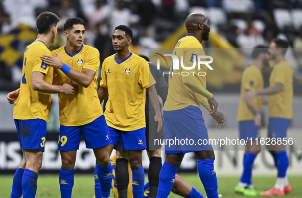 Players of Al Gharafa SC celebrate after winning the AFC Champions League elite west football match between Qatar's Al Gharafa SC and United...