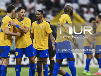 Players of Al Gharafa SC celebrate after winning the AFC Champions League elite west football match between Qatar's Al Gharafa SC and United...