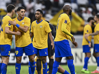 Players of Al Gharafa SC celebrate after winning the AFC Champions League elite west football match between Qatar's Al Gharafa SC and United...