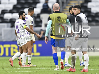 Players of Al Ain FC express their dejection after the AFC Champions League elite west football match between Qatar's Al Gharafa SC and Unit...