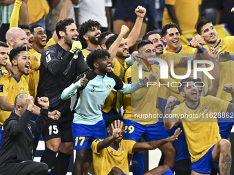 Players of Al Gharafa SC celebrate after winning the AFC Champions League elite west football match between Qatar's Al Gharafa SC and United...