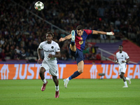 Robert Lewandowski and Tanguy Banhie Zoukro play during the match between FC Barcelona and BSC Young Boys in the week 2 of the League Stage...