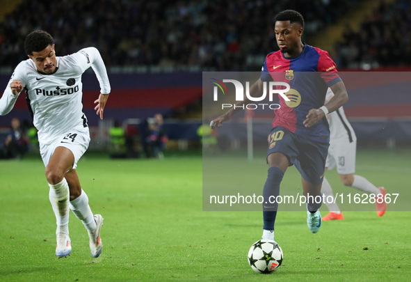 Ansu Fati and Zachary Athekame play during the match between FC Barcelona and BSC Young Boys in the week 2 of the League Stage of the UEFA C...