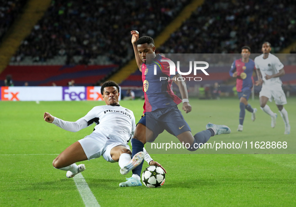 Ansu Fati and Zachary Athekame play during the match between FC Barcelona and BSC Young Boys in the week 2 of the League Stage of the UEFA C...