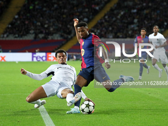 Ansu Fati and Zachary Athekame play during the match between FC Barcelona and BSC Young Boys in the week 2 of the League Stage of the UEFA C...