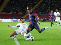 Ansu Fati and Zachary Athekame play during the match between FC Barcelona and BSC Young Boys in the week 2 of the League Stage of the UEFA C...