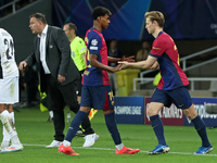 Lamine Yamal and Frenkie de Jong play during the match between FC Barcelona and BSC Young Boys in the week 2 of the League Stage of the UEFA...