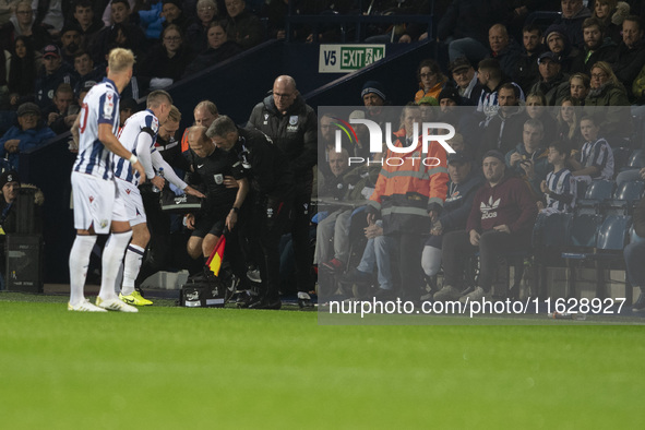 Rob Smith is the assistant referee taken ill during the Sky Bet Championship match between West Bromwich Albion and Middlesbrough at The Haw...