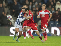 Finn Azaz of Middlesbrough battles for the ball with Alex Mowatt of West Bromwich Albion during the Sky Bet Championship match between West...