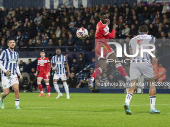 Middlesbrough's Emmanuel Latte Lath heads the ball, but his header is wide during the Sky Bet Championship match between West Bromwich Albio...