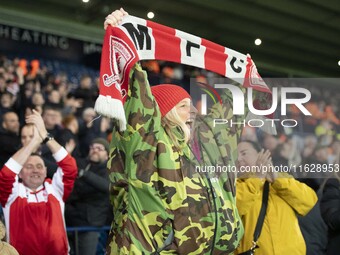 Middlesbrough fans celebrate at the final whistle during the Sky Bet Championship match between West Bromwich Albion and Middlesbrough at Th...