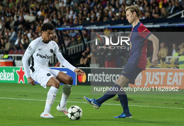 Frenkie de Jong and Zachary Athekame play during the match between FC Barcelona and BSC Young Boys in the week 2 of the League Stage of the...