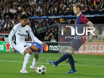 Frenkie de Jong and Zachary Athekame play during the match between FC Barcelona and BSC Young Boys in the week 2 of the League Stage of the...