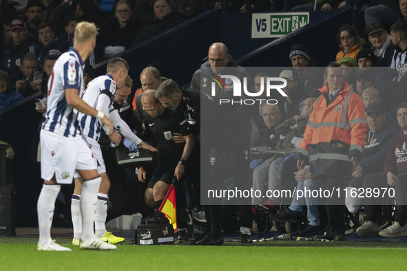 Rob Smith is the assistant referee taken ill during the Sky Bet Championship match between West Bromwich Albion and Middlesbrough at The Haw...