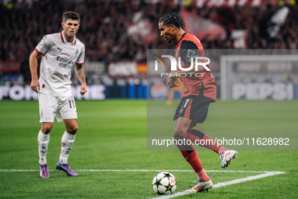 Amine Adli of Bayer 04 Leverkusen is in action during the UEFA Champions League 2024/25 League Phase MD2 match between Bayer 04 Leverkusen a...