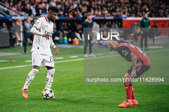 Alejandro Grimaldo of Bayer 04 Leverkusen and Emerson of AC Milan are in action during the UEFA Champions League 2024/25 League Phase MD2 ma...