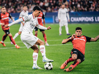 Tijjani Reijnders of AC Milan and Piero Hincapie of Bayer 04 Leverkusen are in action during the UEFA Champions League 2024/25 League Phase...