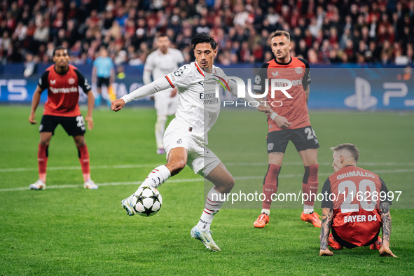 Tijjani Reijnders of AC Milan is in action during the UEFA Champions League 2024/25 League Phase MD2 match between Bayer 04 Leverkusen and A...