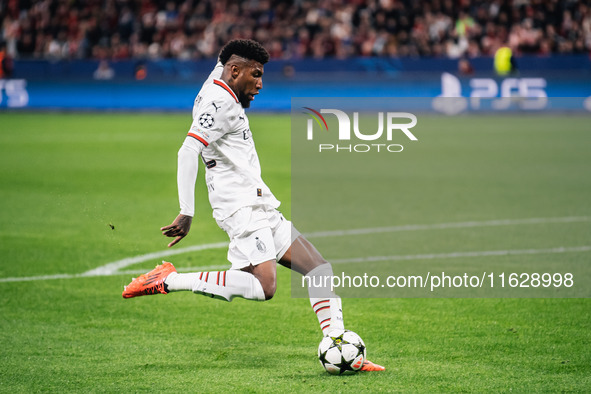 Emerson of AC Milan shoots the ball during the UEFA Champions League 2024/25 League Phase MD2 match between Bayer 04 Leverkusen and AC Milan...