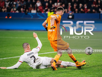 Alvaro Morata of AC Milan and Lukas Hradecky of Bayer 04 Leverkusen are in action during the UEFA Champions League 2024/25 League Phase MD2...