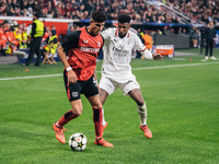 Emerson of AC Milan and Piero Hincapie of Bayer 04 Leverkusen are in action during the UEFA Champions League 2024/25 League Phase MD2 match...