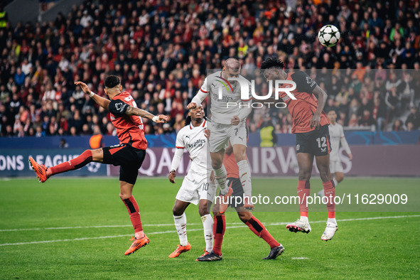 Alvaro Morata of AC Milan and Edmond Tapsoba of Bayer 04 Leverkusen are in action during the UEFA Champions League 2024/25 League Phase MD2...