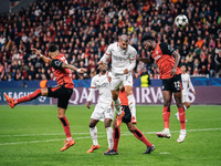 Alvaro Morata of AC Milan and Edmond Tapsoba of Bayer 04 Leverkusen are in action during the UEFA Champions League 2024/25 League Phase MD2...